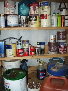 shelves with common household hazardous waste, such as paints